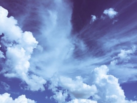 White clouds in a blue sky.